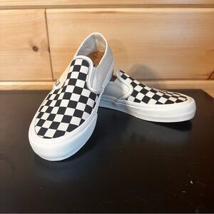 Vans Black and White Checkered Slip-On Sneakers
